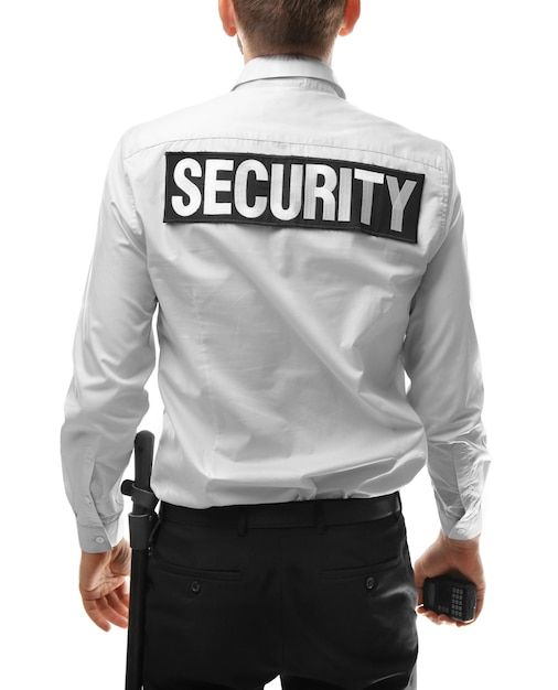 "Trained security personnel monitoring surveillance system in control room."