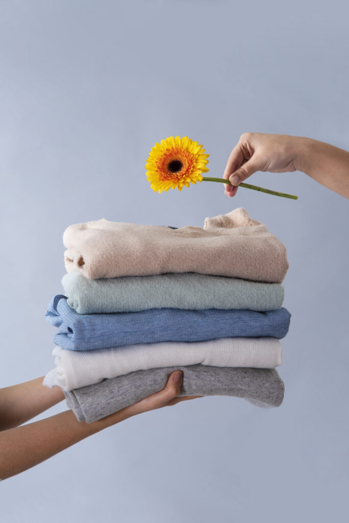 "Commercial laundry team handling linen and uniforms in a modern facility."